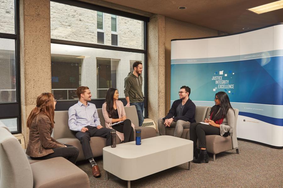 Students conversing in a common room